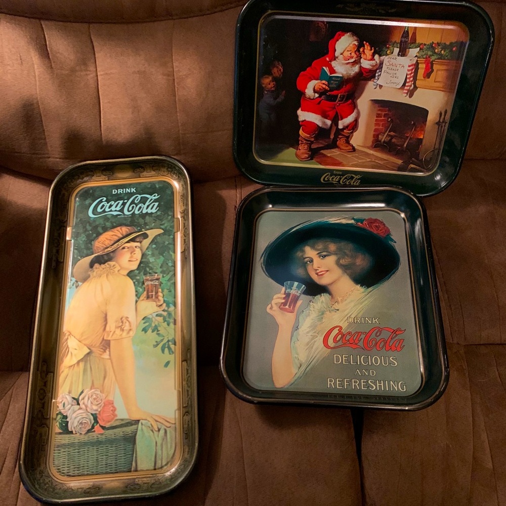 Vintage Coca Cola trays.